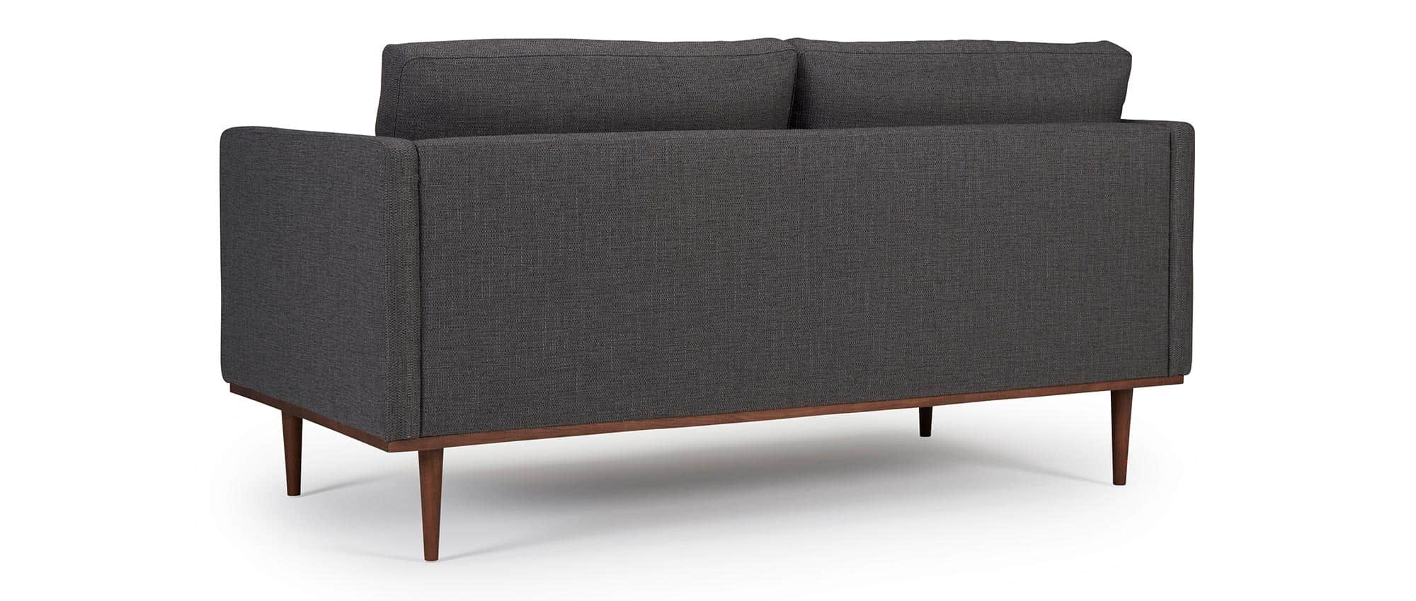 Das Designer Sofa OSLO ist auch auf der Rückseite in Ihrer Stoff- oder Lederauswahl bezogen