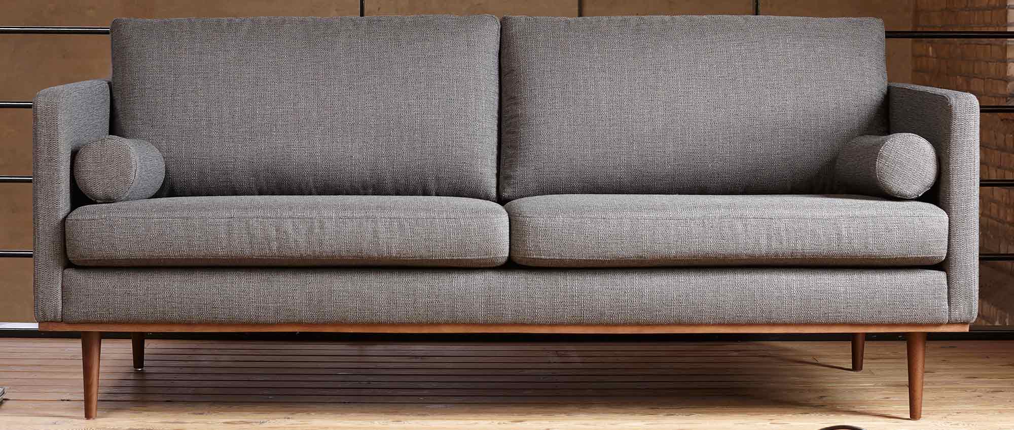 Hier sehen Sie die ZYLINDER Kissen am OSLO 3-Sitzer Sofa