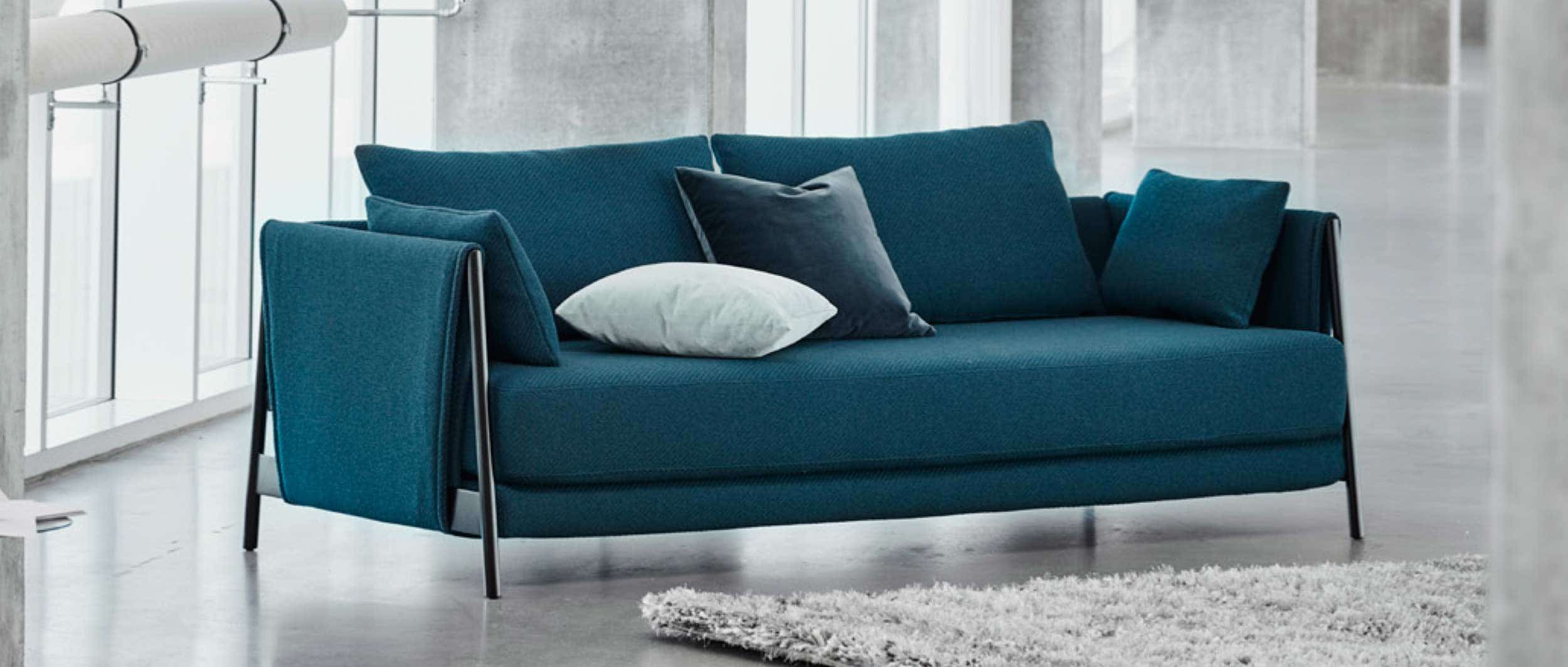 Die schönen Armlehnenkissen sind immer im Lieferumfang der MADISON Schlafcouch enthalten 