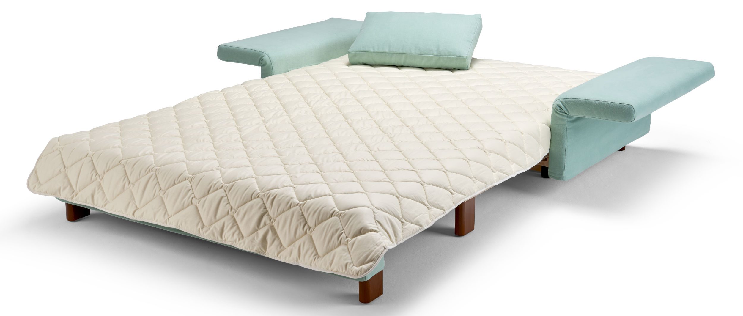 Das PAULA Schlafsofa ist ein ideales Gästebett - hier mit Baumwollauflage