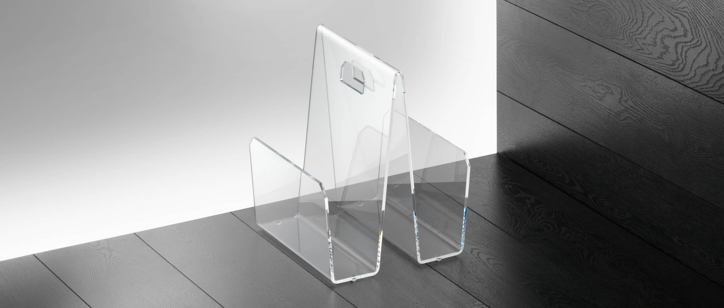 Der Zeitschriftenständer KÖLN aus Plexiglas im modernen Design