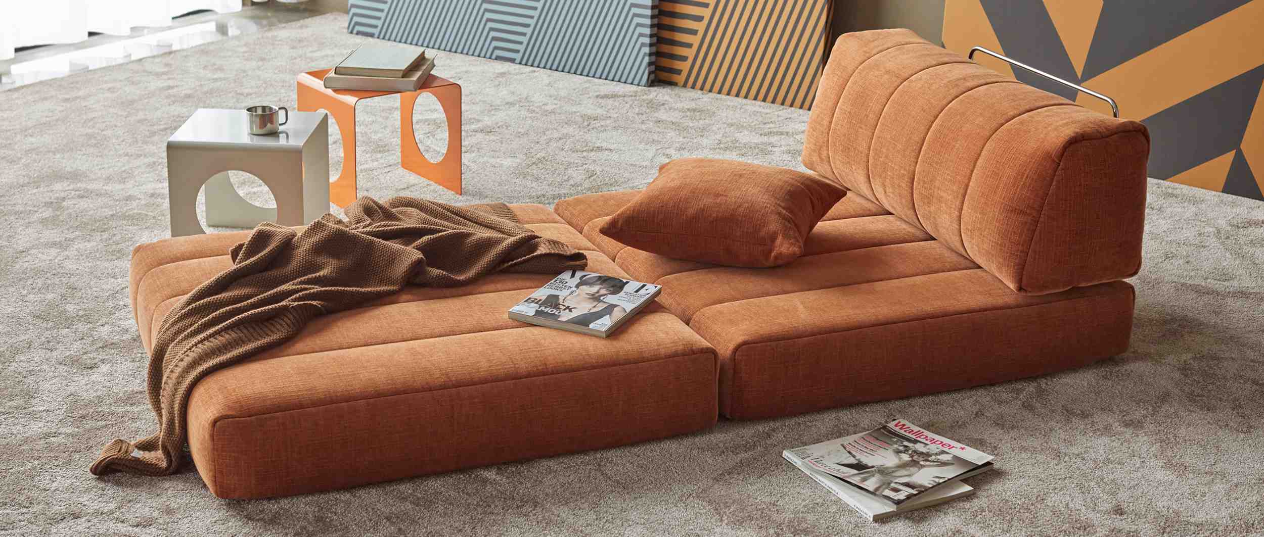 Dank der eleganten Versteppung ist der COZYPAD Schlafsessel von Innovation ein echter Blickfang in jedem Raumkonzept