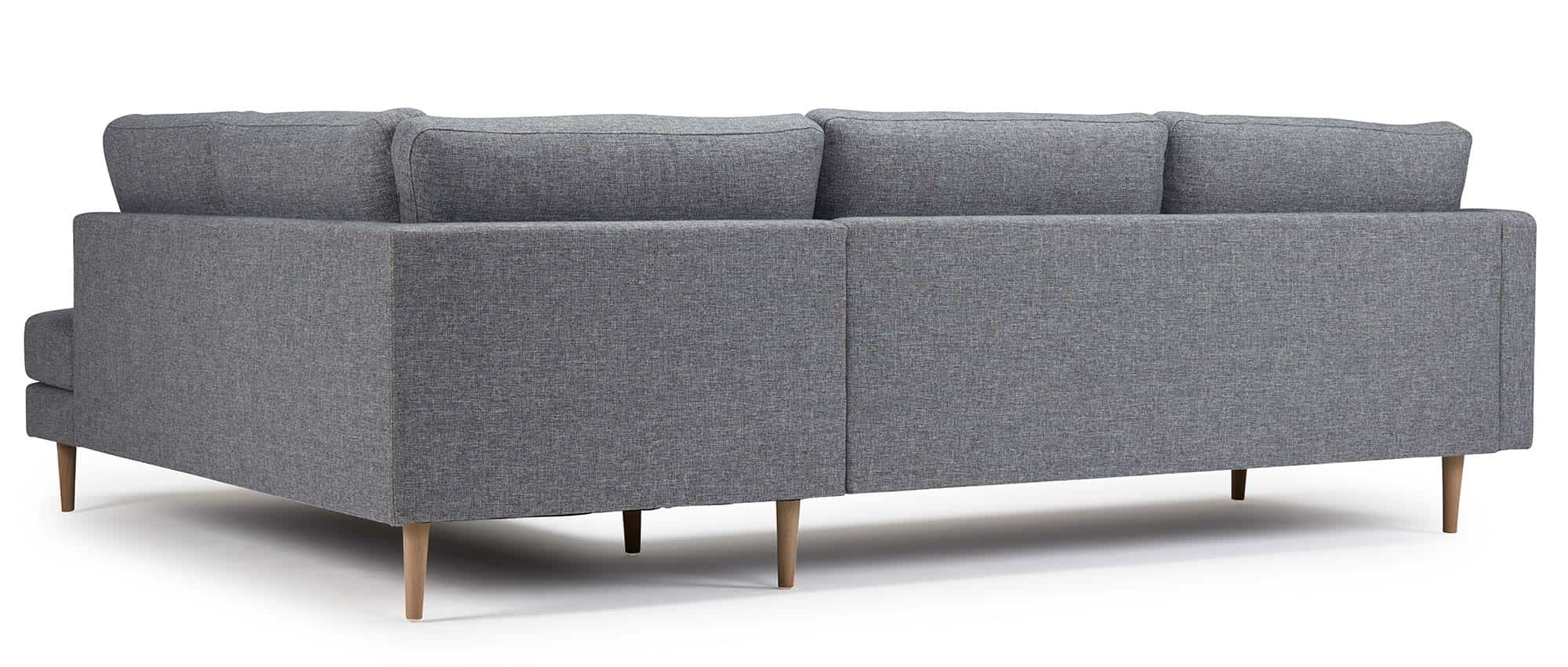 Das TRONDHEIM Ecksofa mit Eckanbau ist auch auf der Rückseite in Ihrer Stoffauswahl bezogen