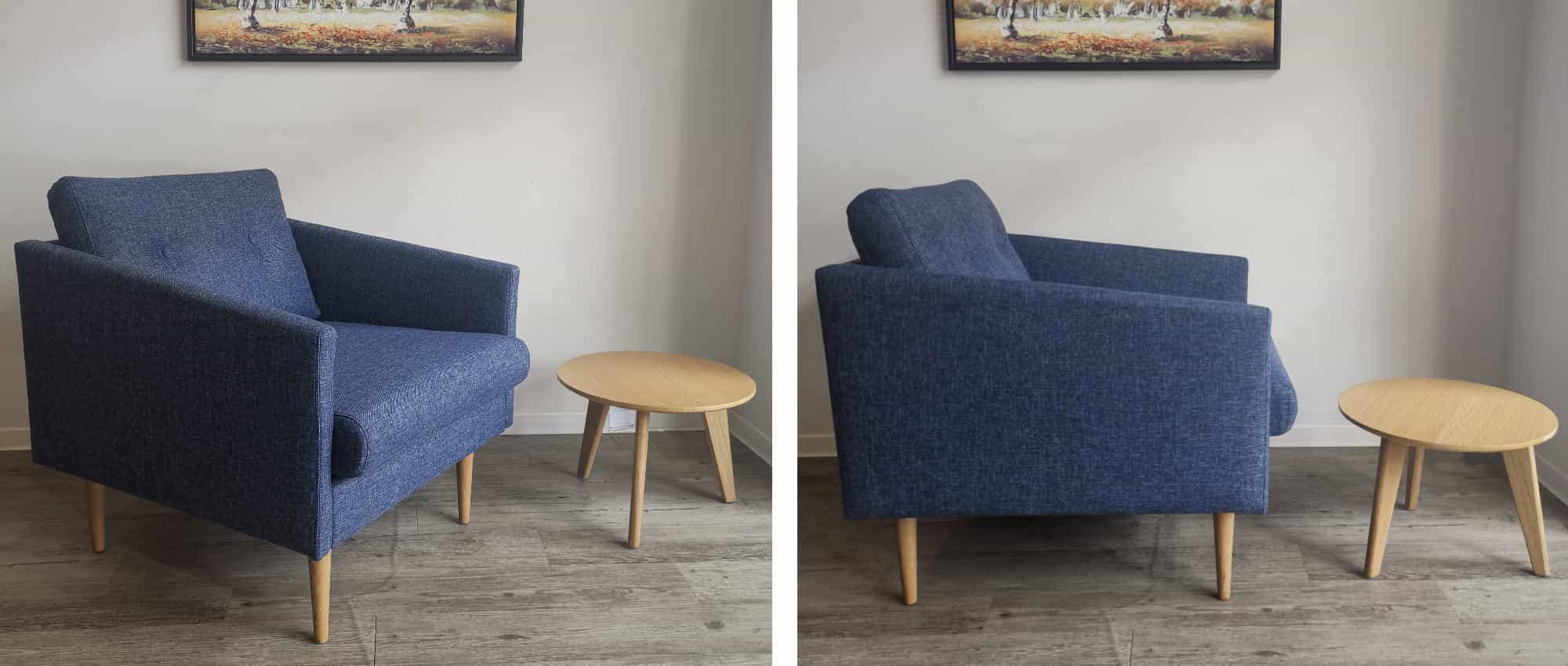 Hier der KARLSTAD Designer Sessel mit Füßen in Eiche lackiert, kombiniert mit dem NORDIC Tisch von Innovation