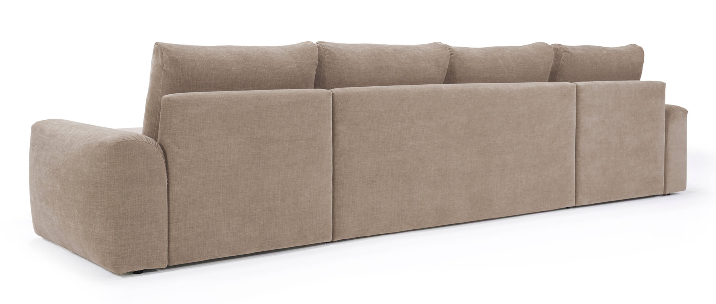 Die stoffbezogene Rückseite des NORUM Schlafsofas in U-Form ermöglicht eine freie Platzierung im Wohnzimmer